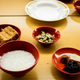 Breakfast—rice porridge, pickled vegetables and deep fried tofu.